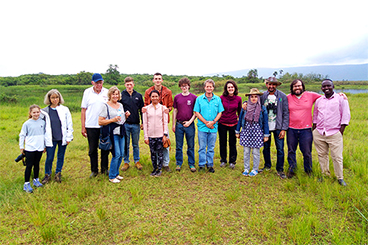 Tourists pause for a photograph